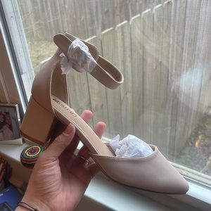 NEW nude closed toe pumps